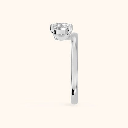 Maisie Four Prong Solitaire Oval Diamond Engagement Ring in Silver - SideView.webp