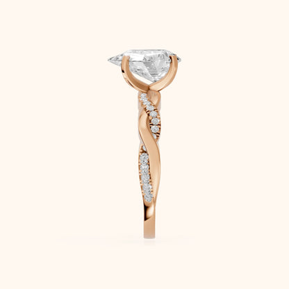 Twisted Side Stone Pear Diamond Engagement Ring in Rose Gold - SideView