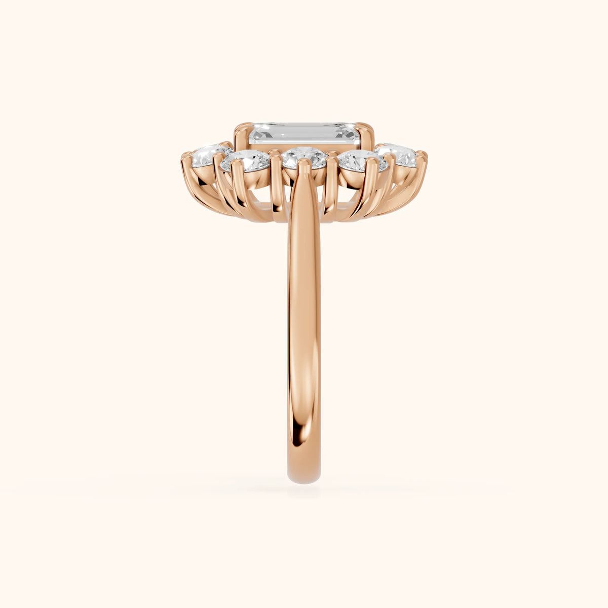 Phoebe Cluster Emerald Diamond Engagement Ring in Rose Gold - SideView.webp