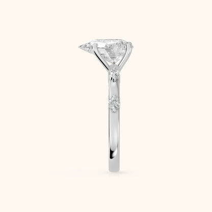 Elena Radiance Solitaire Pear Diamond Engagement Ring in Platinum - SideView