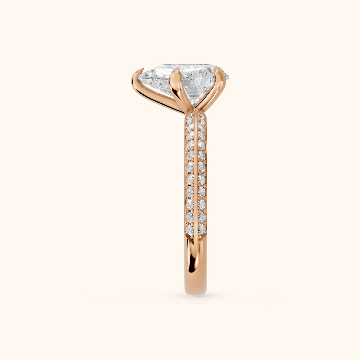 Meredith Knife Edge Pavé Pear Diamond Engagement Ring in Rose Gold - SideView.webp