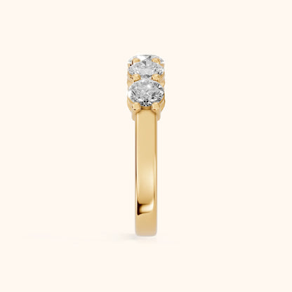 Theia Shared Prong Round Diamond Wedding Band in Yellow Gold - SideView