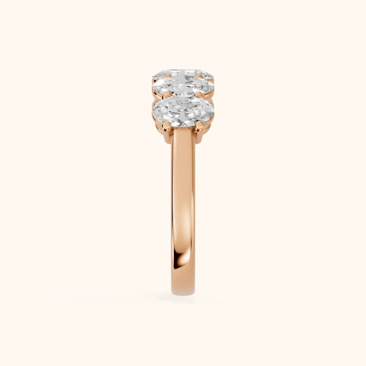 Estela Shared Prong Oval Diamond Wedding Band in Rose Gold - SideView
