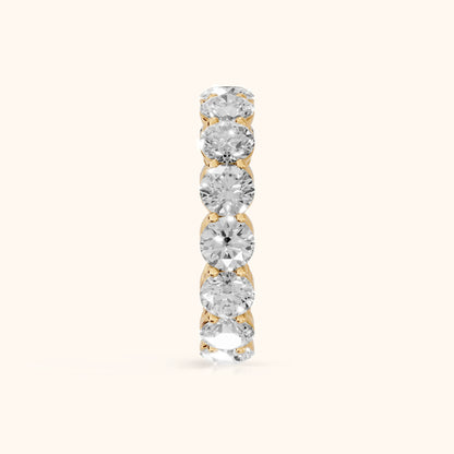 Larissa Shared Prong Round Diamond Eternity Band in Yellow Gold - SideView
