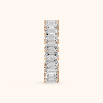 Callia Shared Prong Emerald Diamond Eternity Band in Rose Gold - SideView