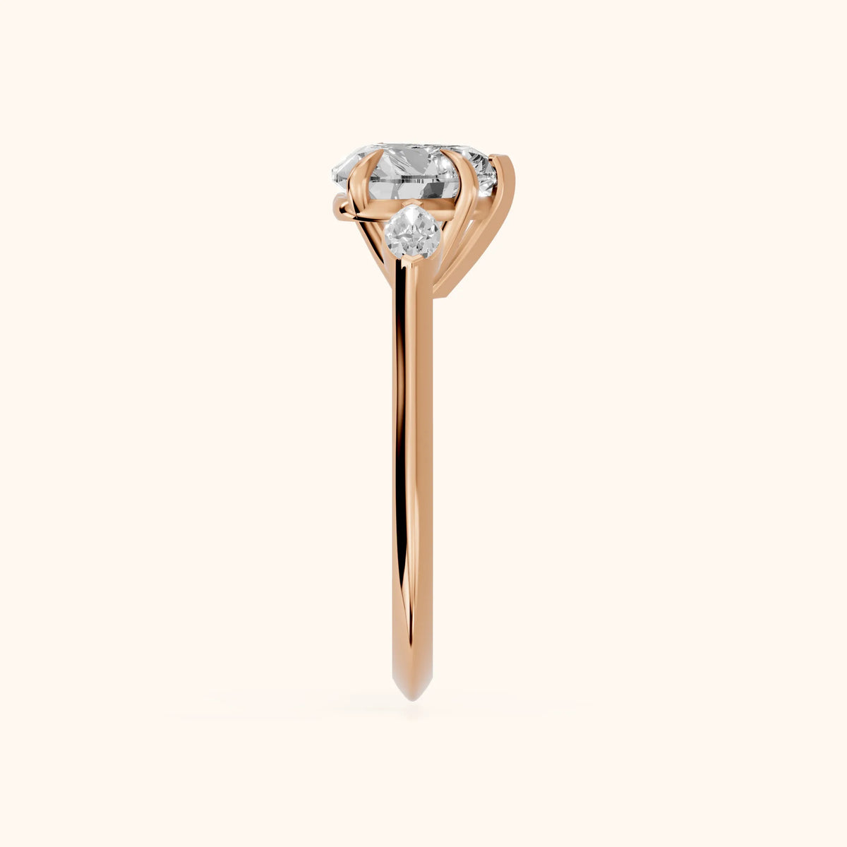 Lyra Three-Stone Heart Diamond Engagement Ring in Rose Gold - SideView.webp