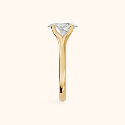 Nell Split Shank Solitaire Oval Diamond Engagement Ring in Yellow Gold - SideView.webp