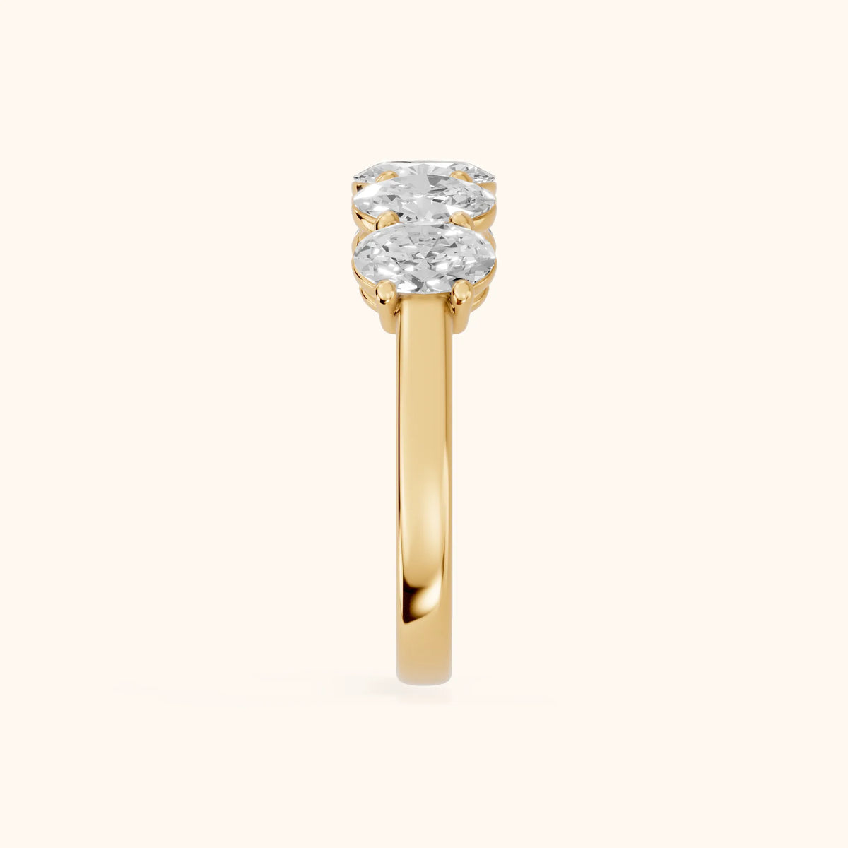 Estela Shared Prong Oval Diamond Wedding Band in Yellow Gold - SideView