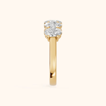 Estela Shared Prong Oval Diamond Wedding Band in Yellow Gold - SideView