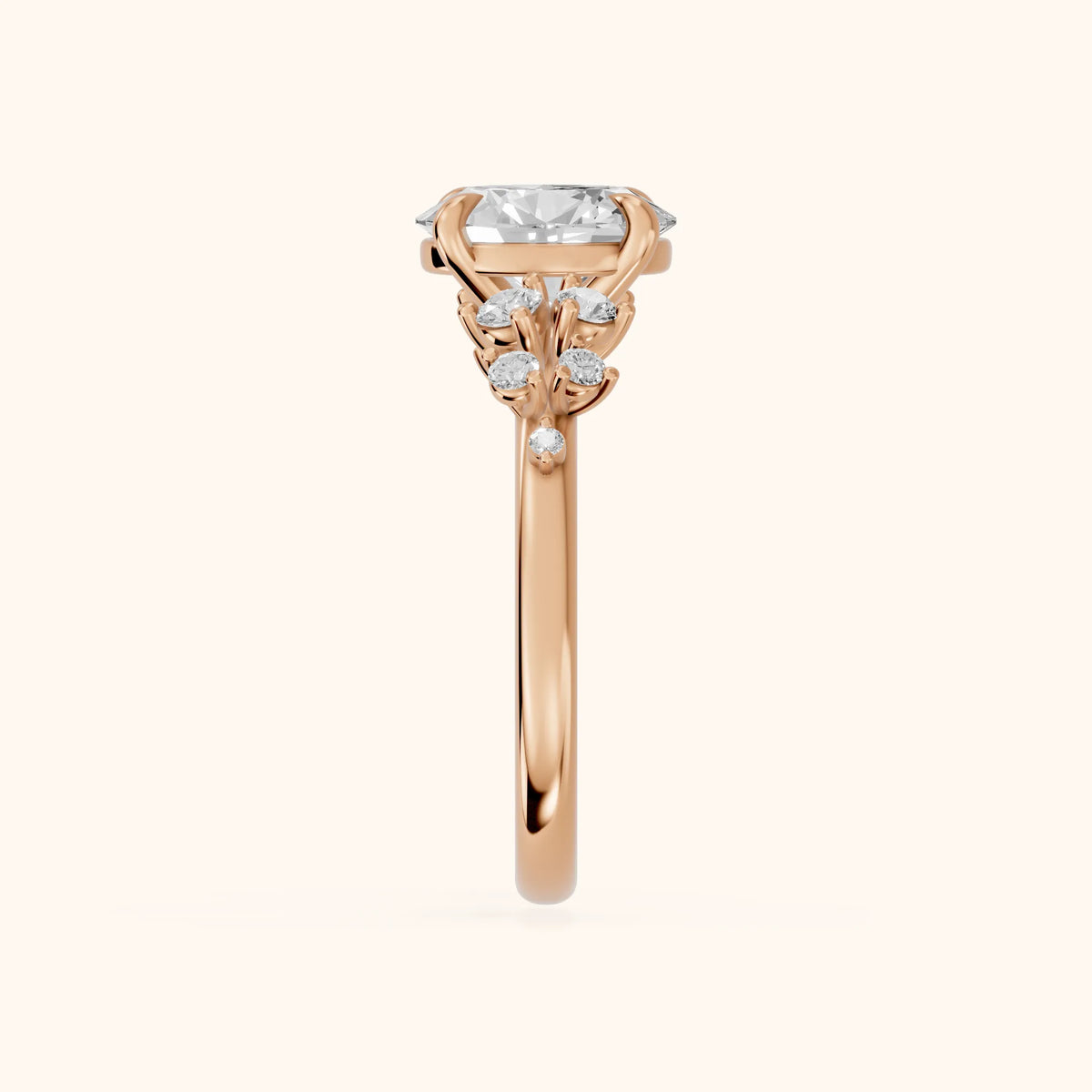 Mirabelle Cluster Oval Diamond Engagement Ring in Rose Gold - SideView.webp