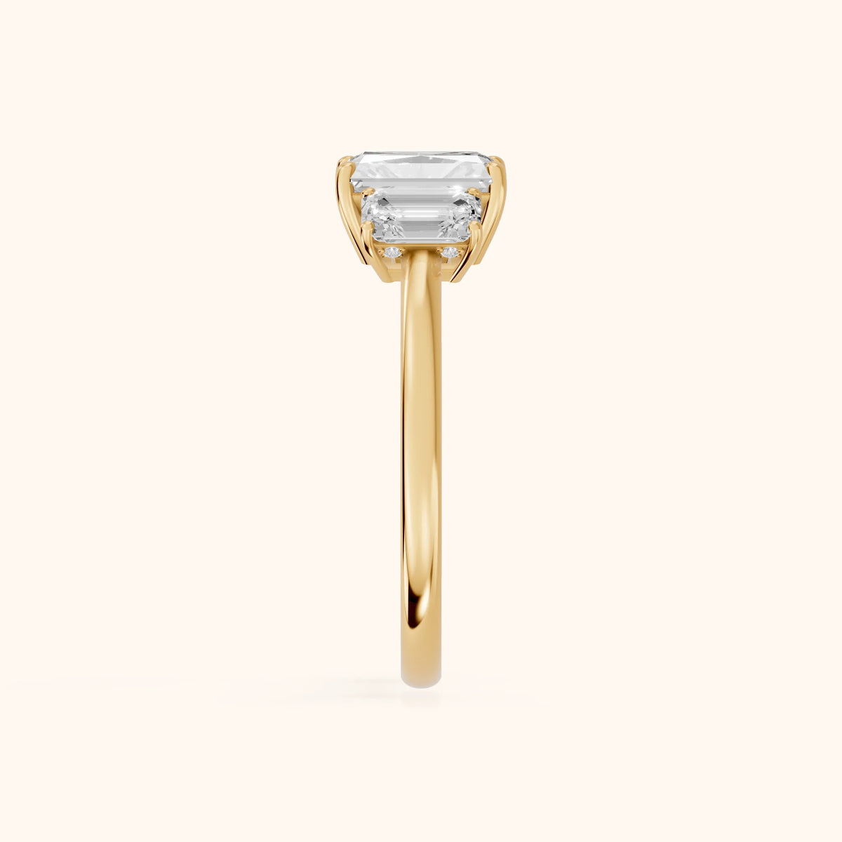 Marian Three-Stone Hidden Halo Radiant Diamond Engagement Ring in Yellow Gold - SideView.webp