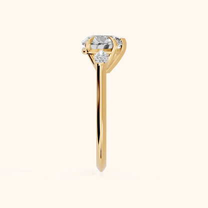 Lyra Three-Stone Heart Diamond Engagement Ring in Yellow Gold - SideView.webp