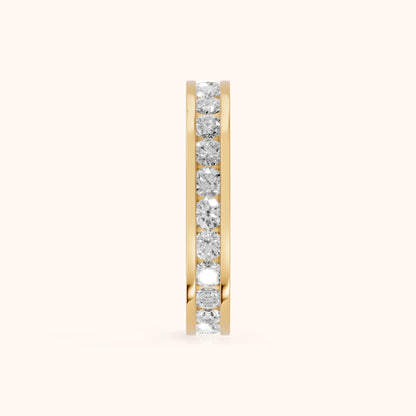 Ayana Channel Set Round Diamond Eternity Band in Yellow Gold - SideView