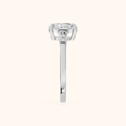 Winnie Three-Stone Oval Diamond Engagement Ring in Platinum - SideView.webp