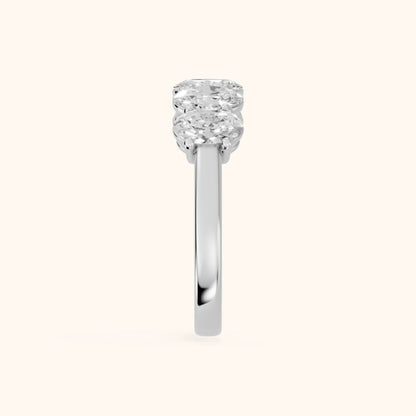 Estela Shared Prong Oval Diamond Wedding Band in Platinum - SideView