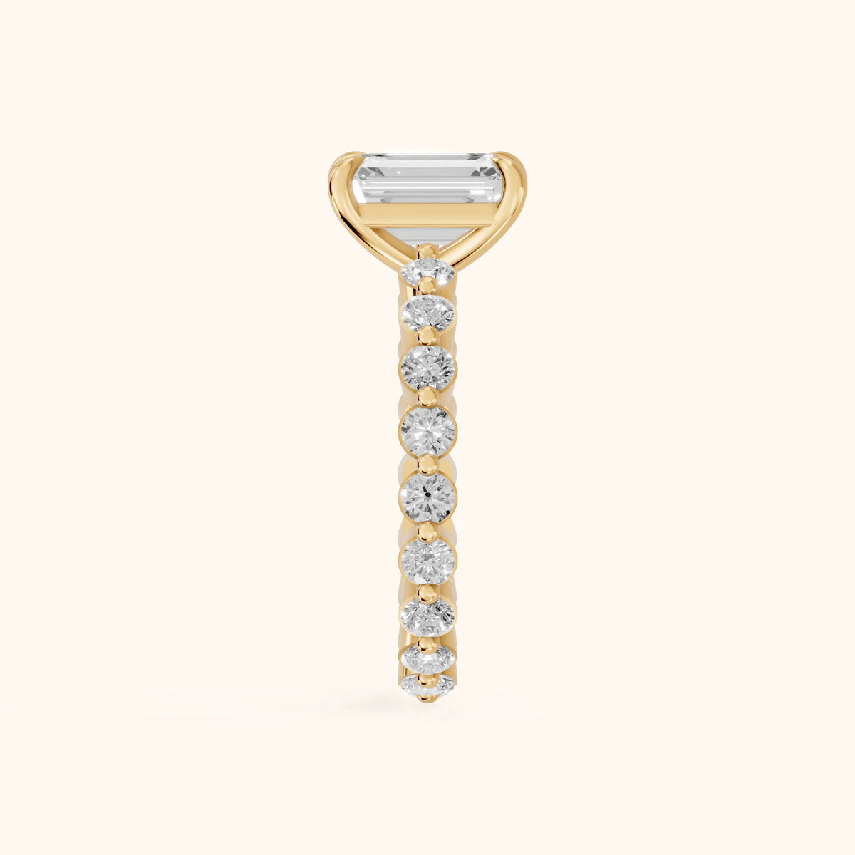 Piper Sidestone Emerald Diamond Engagement Ring in Yellow Gold - SideView.webp