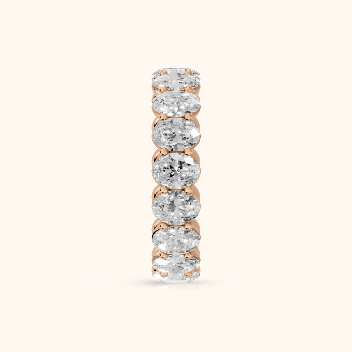 Neha Shared Prong Oval Diamond Eternity Band in Rose Gold - SideView