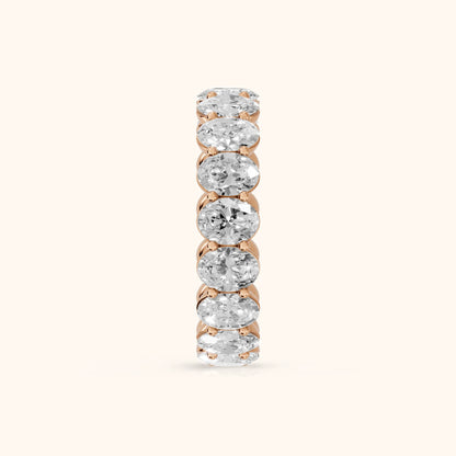 Neha Shared Prong Oval Diamond Eternity Band in Rose Gold - SideView
