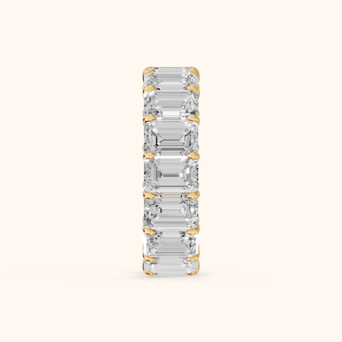 Zia Shared Prong Emerald Diamond Eternity Band in Yellow Gold - SideView