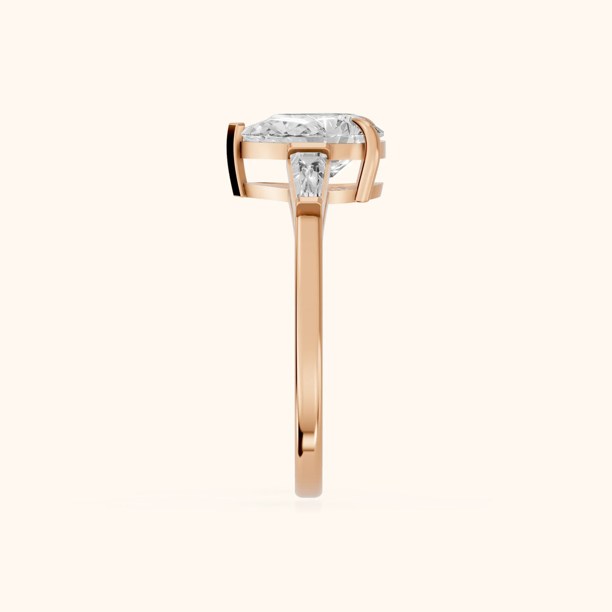 Winnie Three-Stone Pear Diamond Engagement Ring in Rose Gold - SideView.webp