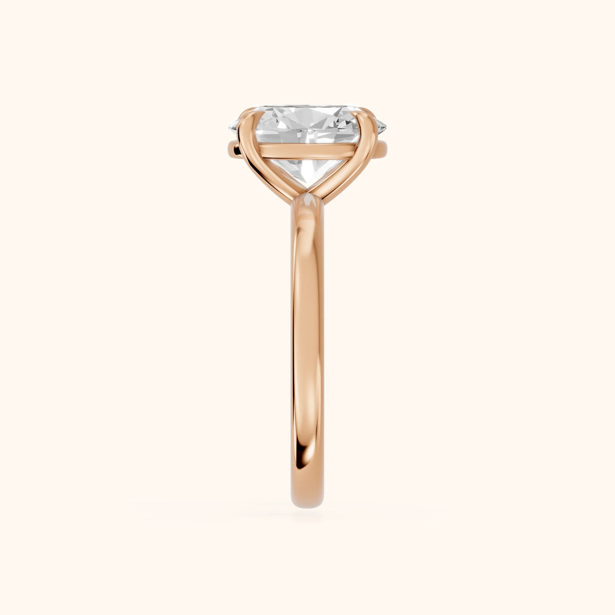 Rowan Basket Solitaire Oval Diamond Engagement Ring in Rose Gold - SideView.webp