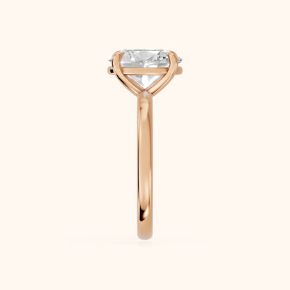 Rowan Basket Solitaire Oval Diamond Engagement Ring in Rose Gold - SideView.webp