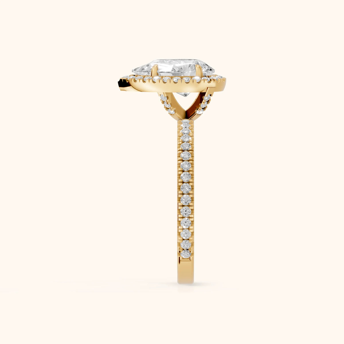Rosemary Halo Pavé Pear Diamond Engagement Ring in Yellow Gold - SideView.webp