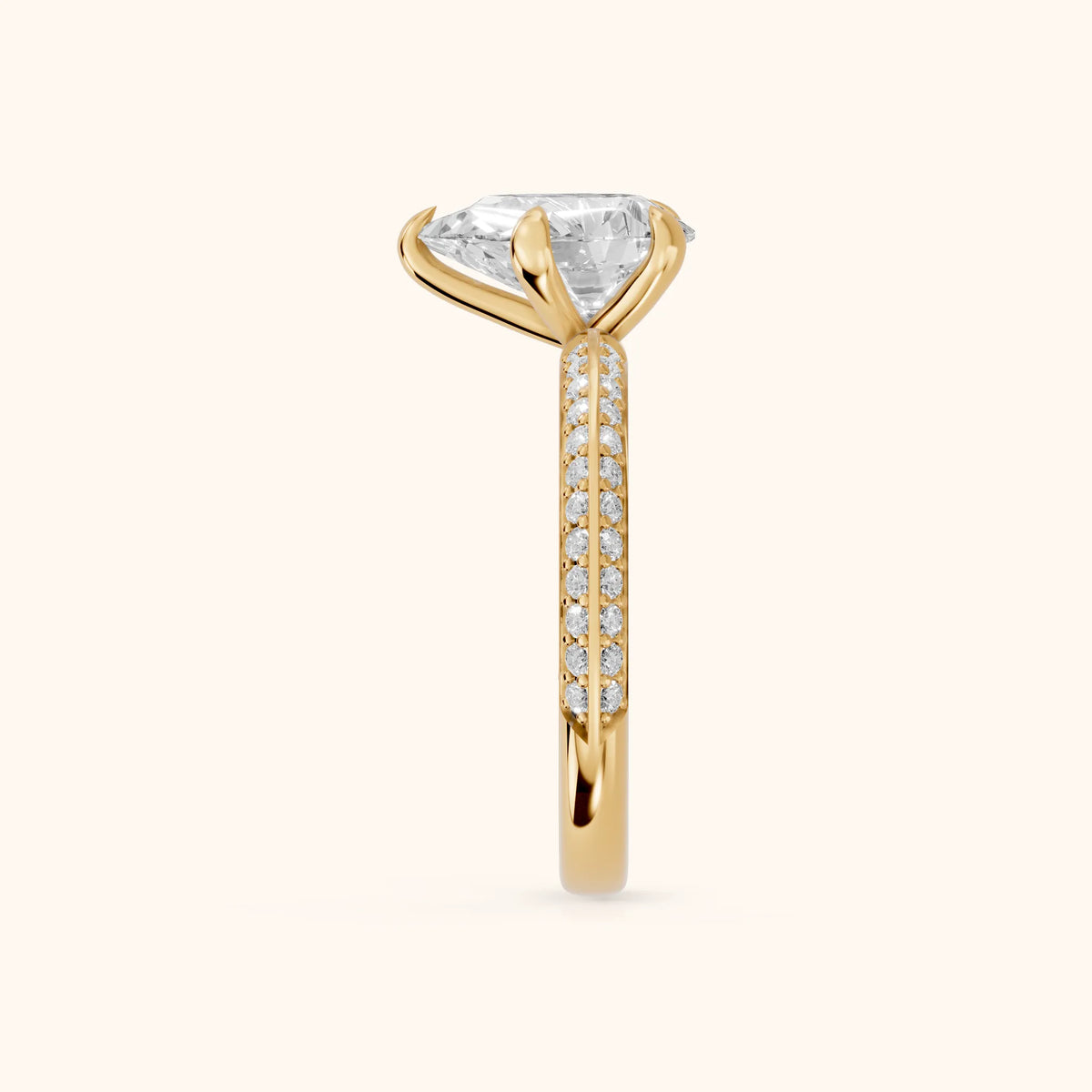Meredith Knife Edge Pavé Pear Diamond Engagement Ring in Yellow Gold - SideView.webp