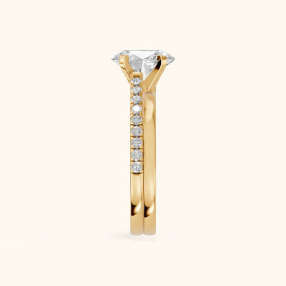 Edith Criss Cross Pavé Oval Diamond Engagement Ring in Yellow Gold - SideView.webp