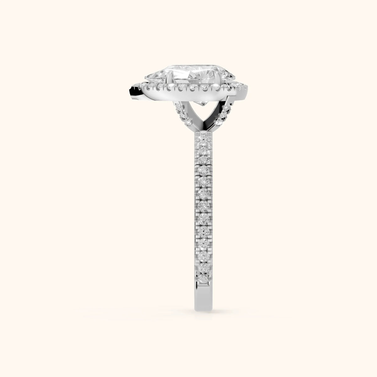Rosemary Halo Pavé Pear Diamond Engagement Ring in Platinum - SideView.webp