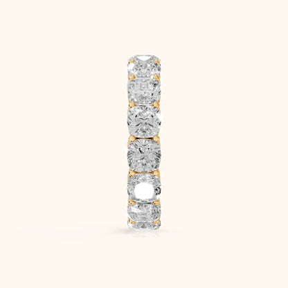 Vida Shared Prong Cushion Diamond Eternity Band in Yellow Gold - SideView