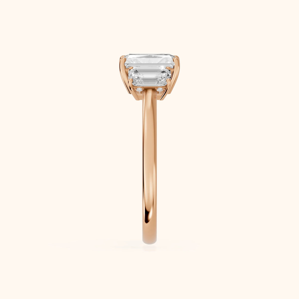 Marian Three-Stone Hidden Halo Radiant Diamond Engagement Ring in Rose Gold - SideView.webp