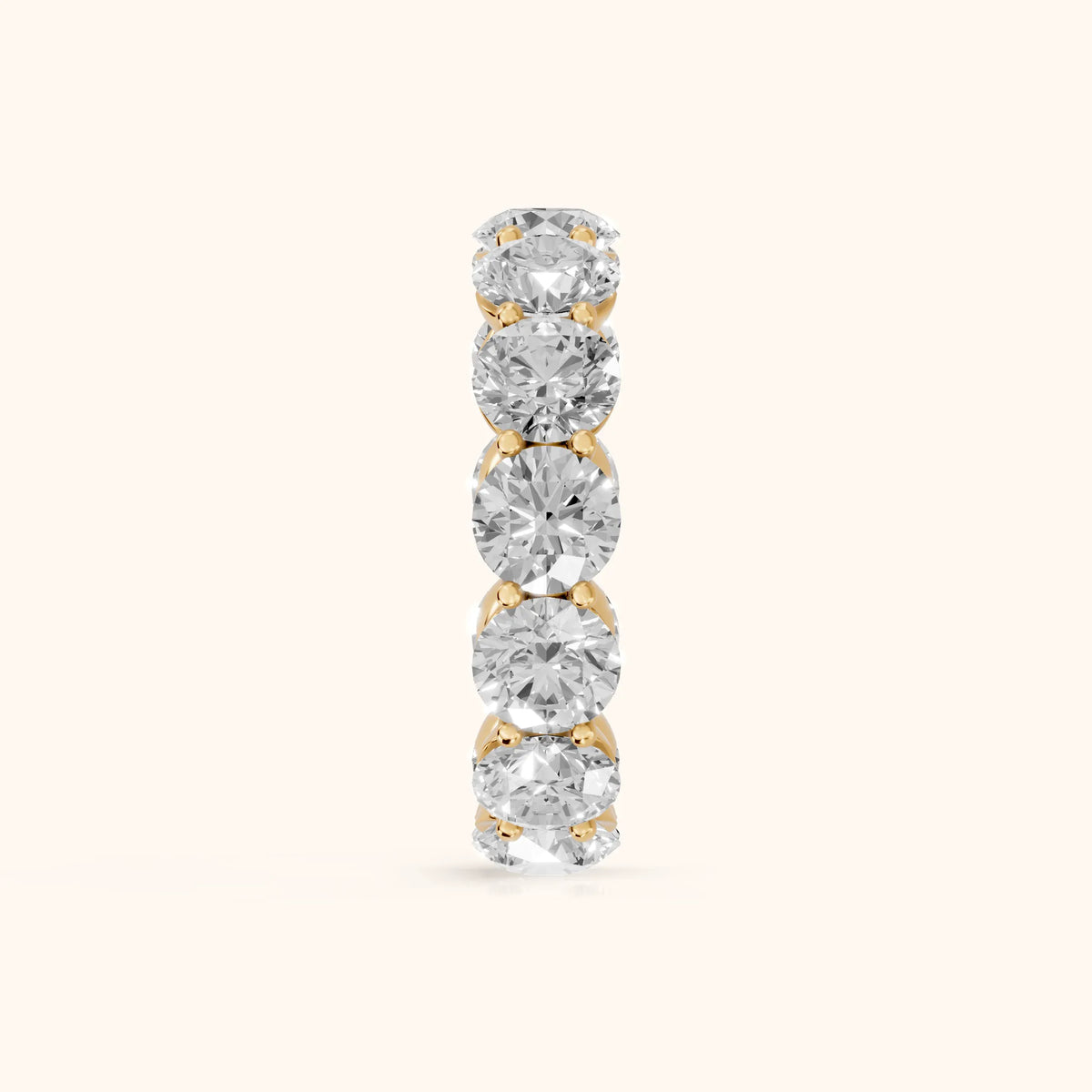 Aditi Claw Prong Round Diamond Eternity Band in Yellow Gold - SideView