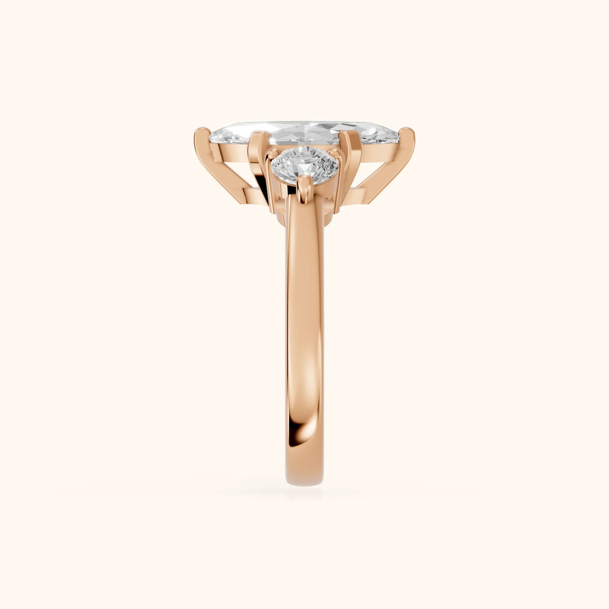 Freesia Three-Stone Marquise Diamond Engagement Ring in Rose Gold - SideView.webp