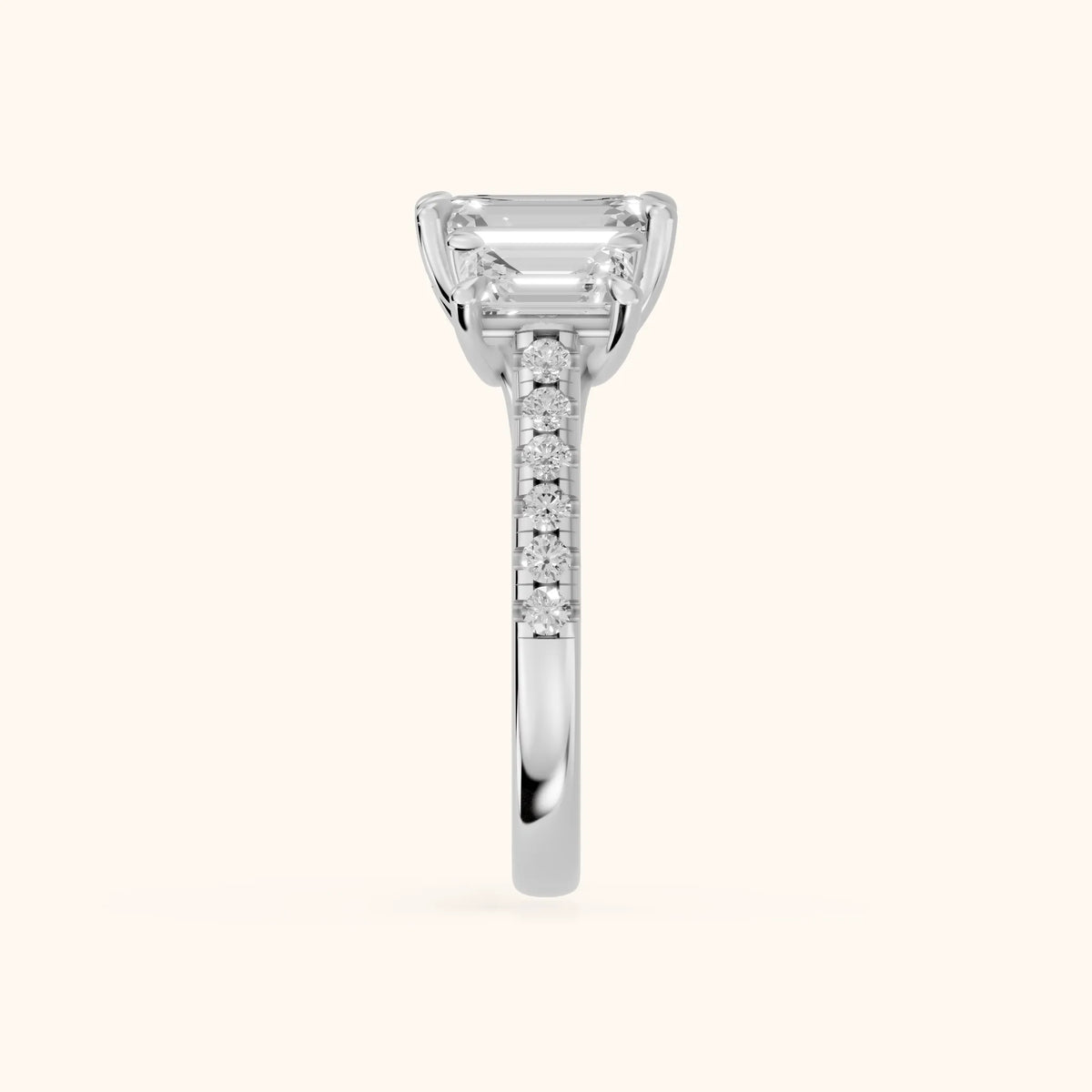 Gabrielle Three-Stone Pavé Emerald Diamond Engagement Ring in Platinum - SideView.webp