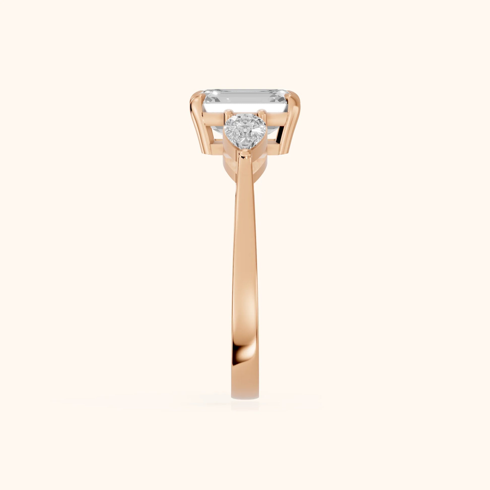 Grace Three Stone Emerald Diamond Engagement Ring in Rose Gold - SideView