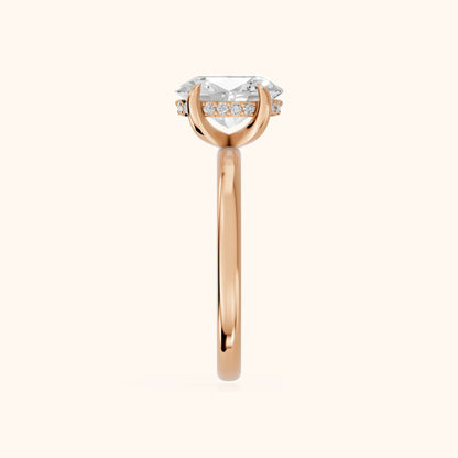 Charlotte Charm Solitaire Oval Diamond Engagement Ring in Rose Gold - SideView