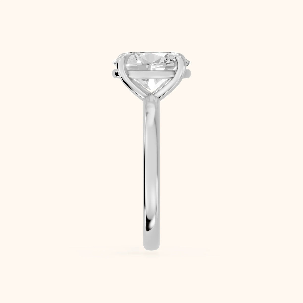 Cassandra Claw Prong Solitaire Oval Diamond Engagement Ring in Silver - SideView.webp