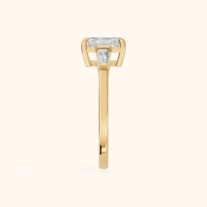 Winnie Three-Stone Radiant Diamond Engagement Ring in Yellow Gold - SideView.webp