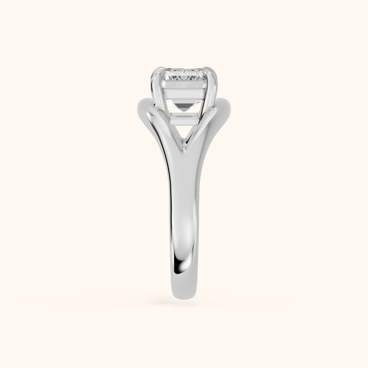 Madeleine Split Shank Emerald Diamond Engagement Ring in Silver - SideView.webp