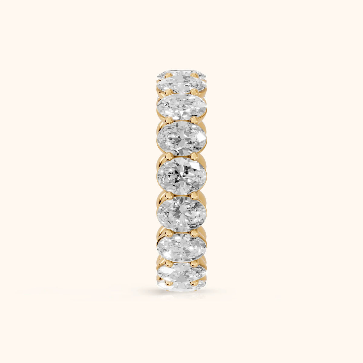 Neha Shared Prong Oval Diamond Eternity Band in Yellow Gold - SideView