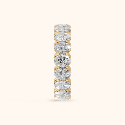 Neha Shared Prong Oval Diamond Eternity Band in Yellow Gold - SideView