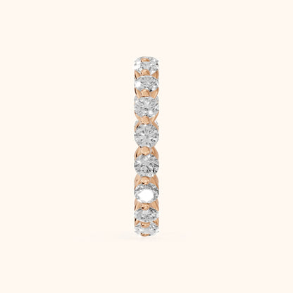 Roshni Shared Prong Round Diamond Eternity Band in Rose Gold - SideView