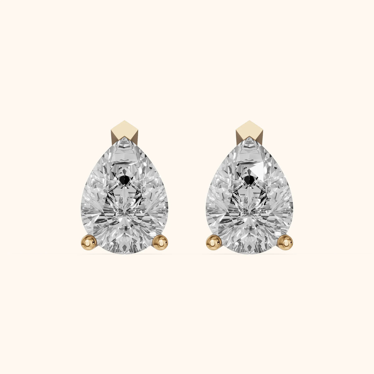Four Prong Pear Diamond Stud Earrings in Yellow Gold - 3D view 2