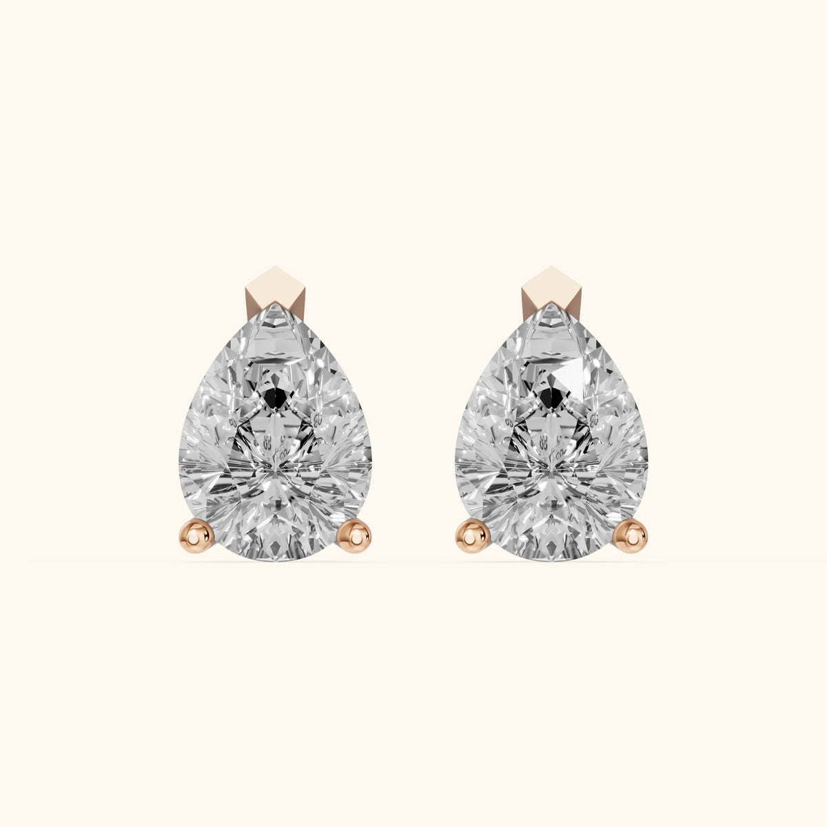Four Prong Pear Diamond Stud Earrings in Rose Gold - 3D view 2