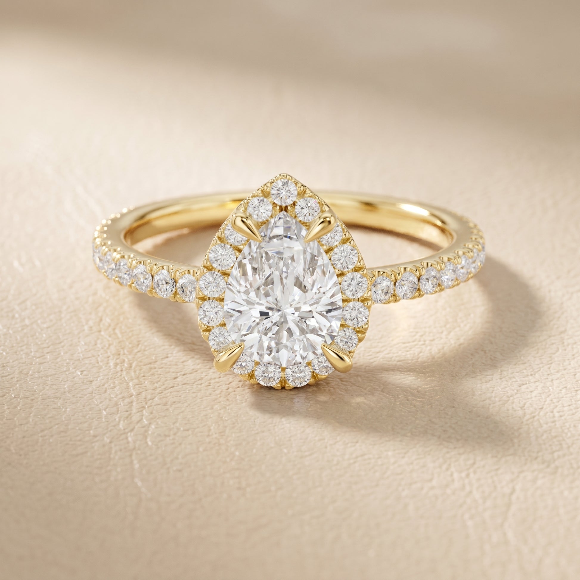 Pear Round Cut Lab Grown Diamond Ring in Yellow Gold