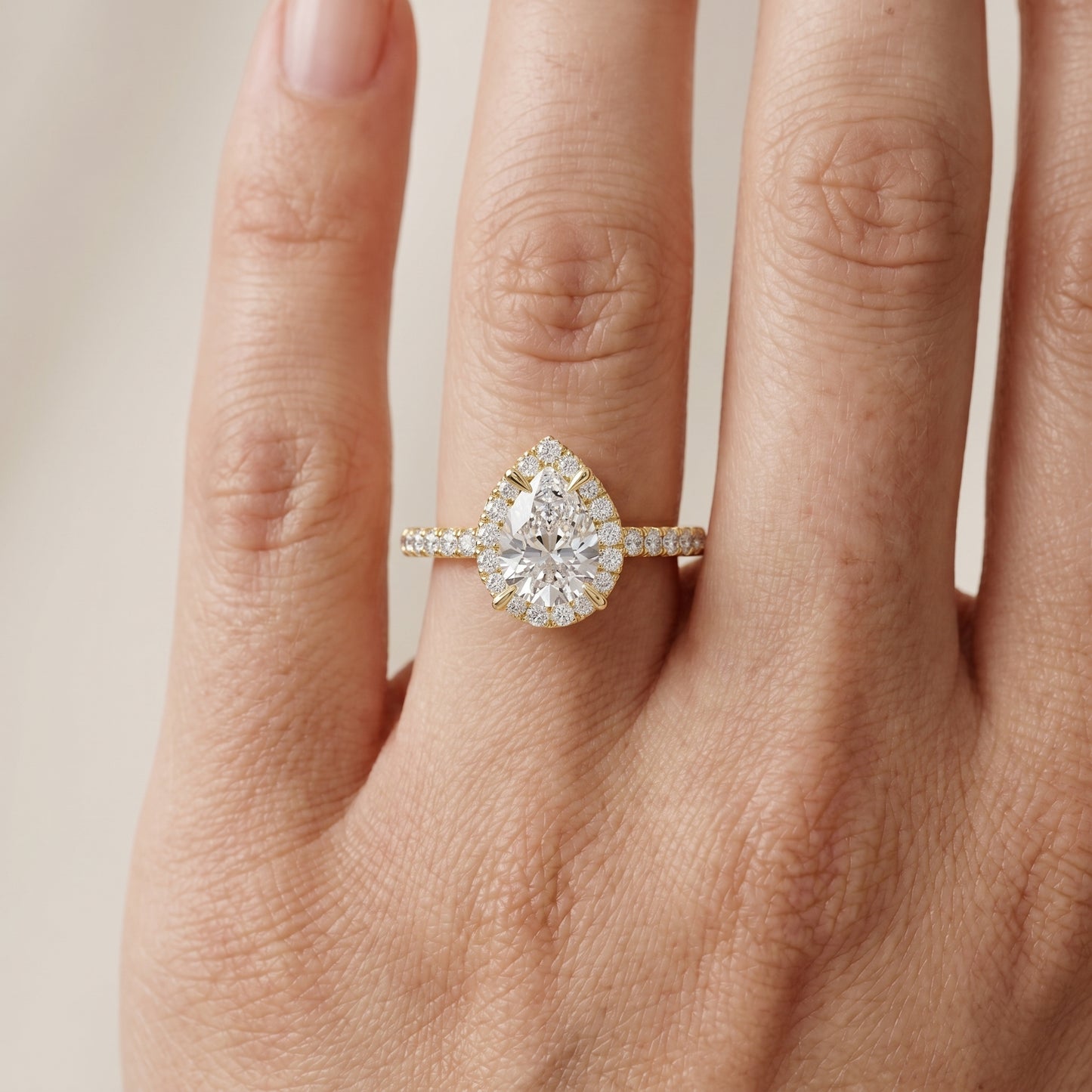 Pear Round Cut Lab Grown Diamond Ring in Yellow Gold