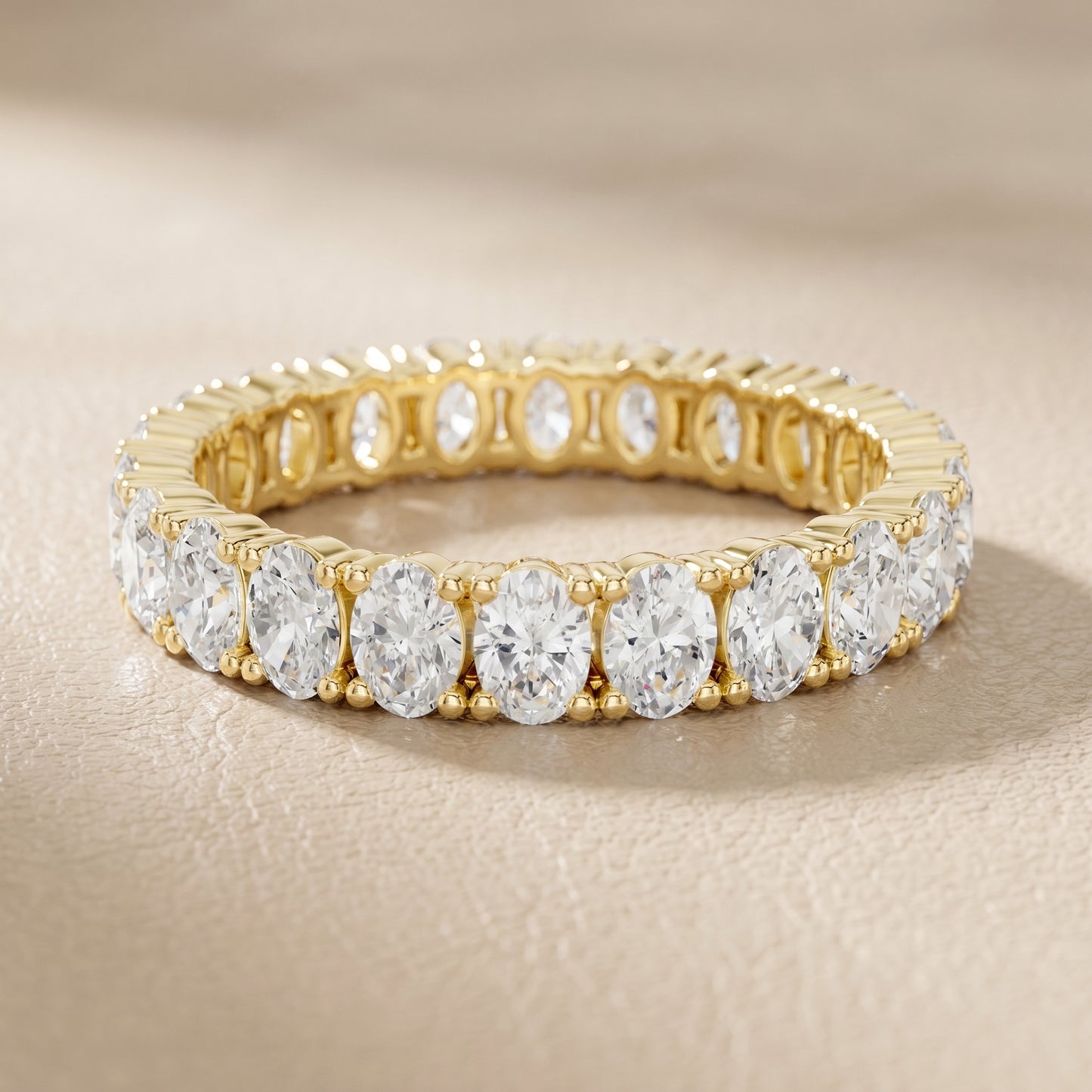 Oval Cut Lab Grown Diamond Eternity Ring in Yellow Gold