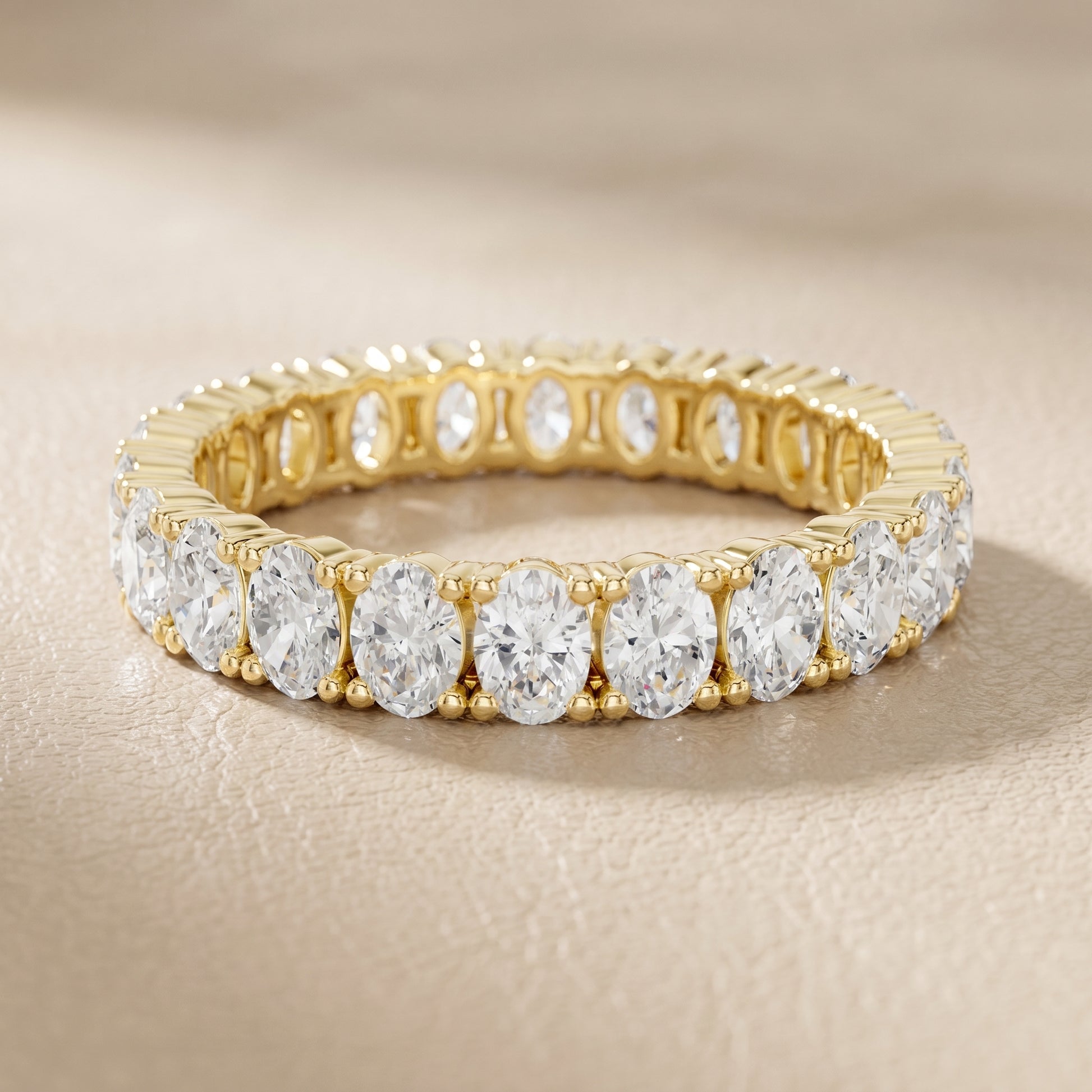 Oval Cut Lab Grown Diamond Eternity Ring in Yellow Gold
