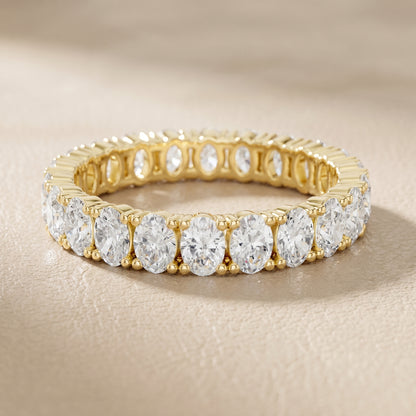 Oval Cut Lab Grown Diamond Eternity Ring in Yellow Gold